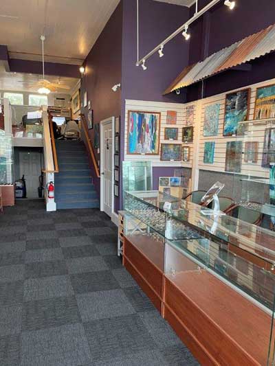 View of front counter of office and art gallery